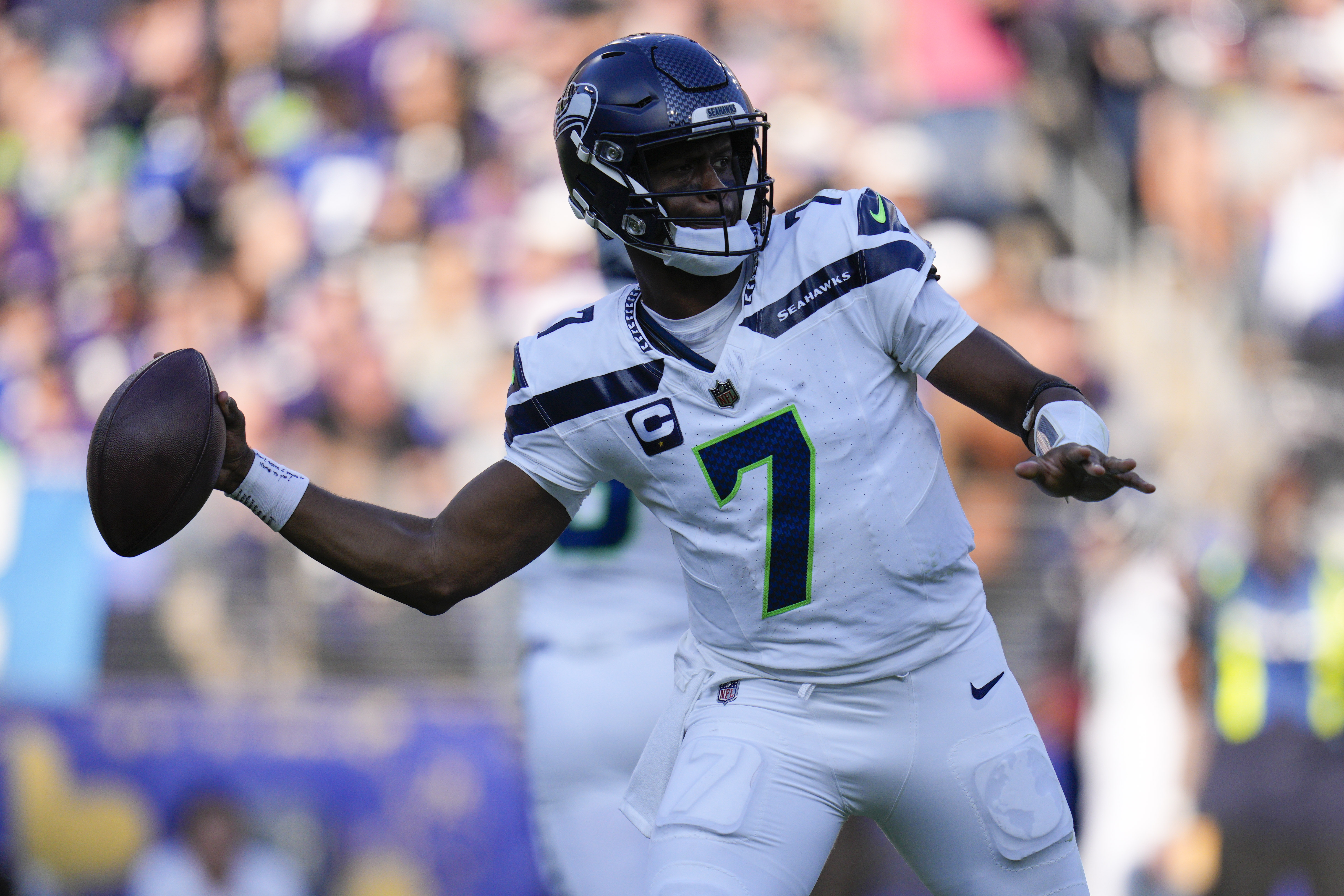 Seattle Seahawks quarterback Geno Smith (7) passes against the Baltimore Ravens during the third quarter at M&T Bank Stadium.